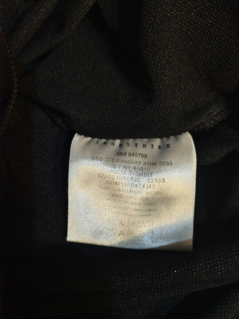 Prada Black Polo Shirt Size L (Category: Tshirts & Polo Shirts ) located in Bayugan. Submitted by boss_rej (Listing ID 1467525727, Image 2). Description: - Brand: Prada - Item: Polo Shirt - Color: Black - Size: L - Condition: Brand new with tags attached - Details: Iconic triangle logo plaque on the left chest, classic collar, and button placket - Style: Versatile staple for casual or smart-casual outfits - Shipping or meetups available across th