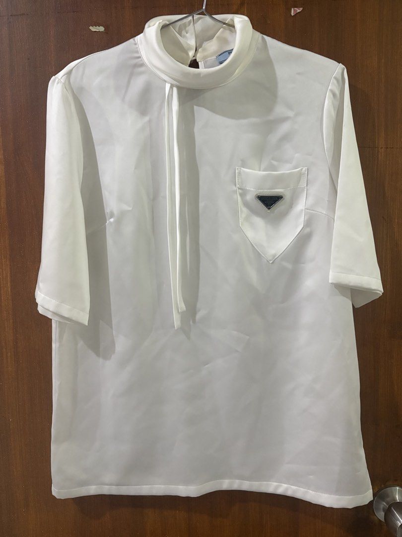 Prada blouse (Category: Blouses) located in Bacolod City. Submitted by strongraiz88110 (Listing ID 1467404317, Image 1). Description: .