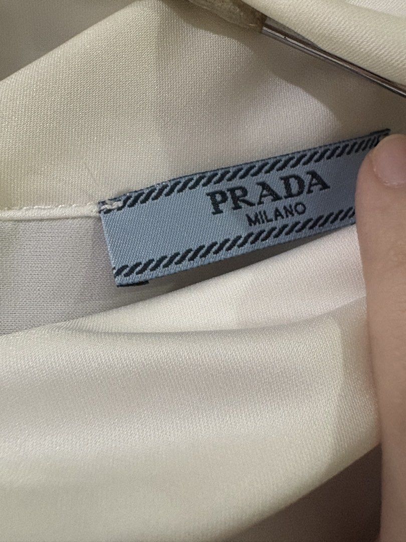 Prada blouse (Category: Blouses) located in Bacolod City. Submitted by strongraiz88110 (Listing ID 1467404317, Image 3). Description: .
