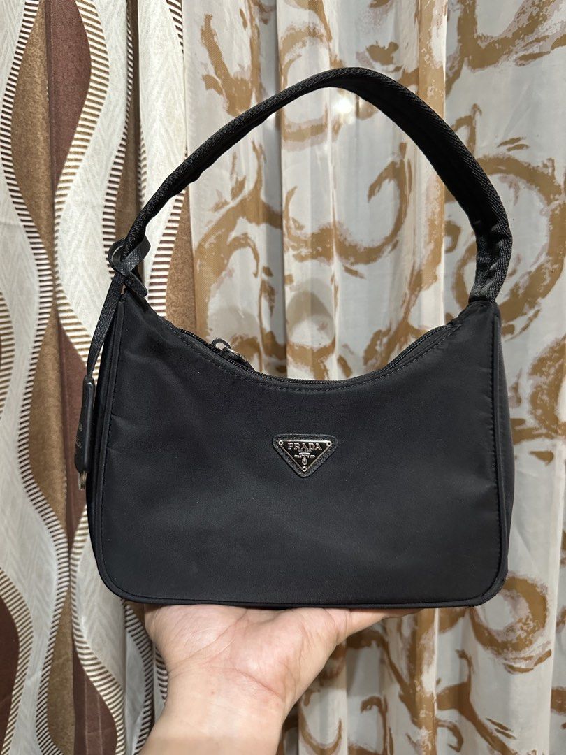 Prada Kili Bag From Japan (Category: Shoulder Bags) located in Manila. Submitted by tianasmom (Listing ID 1467504756, Image 1). Description: Has minor defect please see photos 🇯🇵 Japan preloved lampo zipper Has white tag and black etiketa Last price posted.