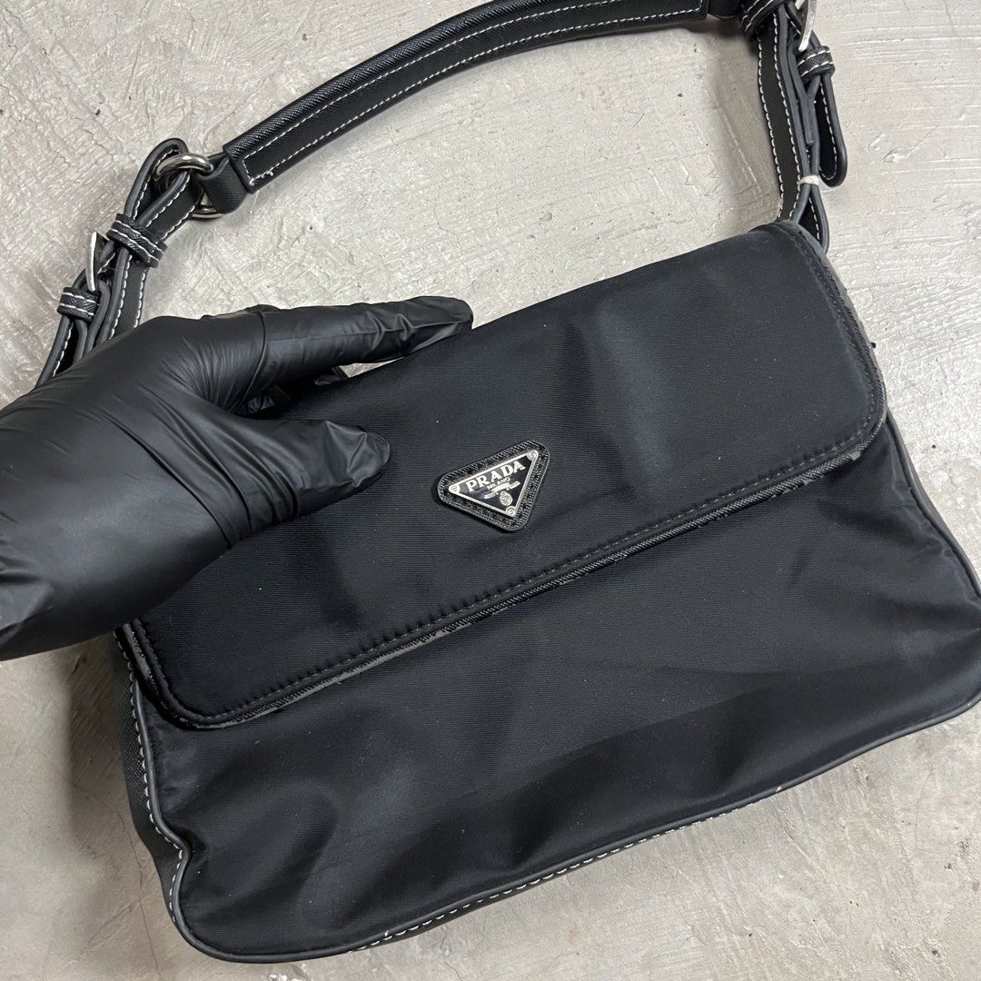 Prada shoulder bag (Category: Luxury Bags & Wallets) located in Tandag. Submitted by archive.dept (Listing ID 1467496625, Image 3). Description: Scratches.