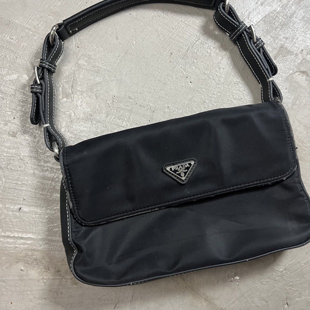 Prada shoulder bag (Category: Luxury Bags & Wallets) located in Tandag. Submitted by archive.dept (Listing ID 1467496625, Image 2). Description: Scratches.