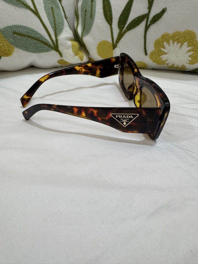 Prada Sunglass (Category: Luxury Accessories) located in Manila. Submitted by luxeluggagestation (Listing ID 1467363524, Image 3). Description: 💯% Authentic Prada Sunglass No flaws to mention Comes with case only ( other inclusions left in Dubai ) Twice used only .