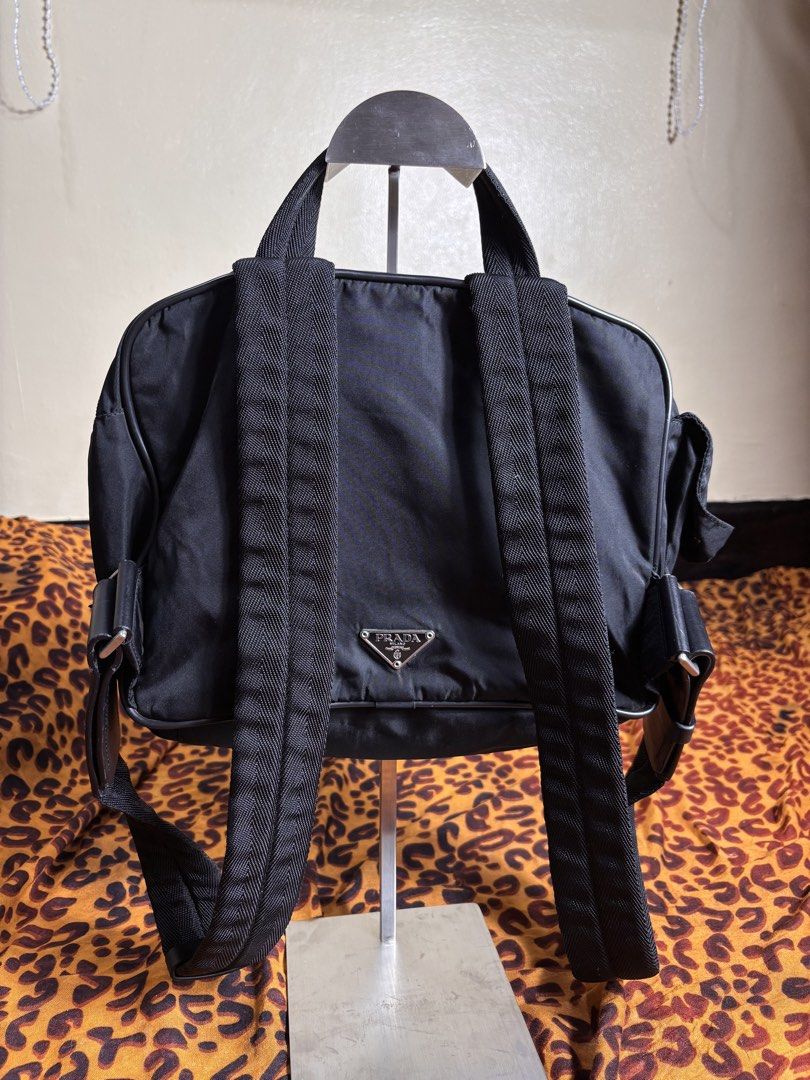 Prada Tessuto Backpack (Category: Backpacks) located in Manila. Submitted by earlylifecrisis3 (Listing ID 1467481048, Image 2). Description: Condition 9/10 Measure it by inch Width: 12.5 Length: 9.5 Depth: 3.5 Handle:14.5 •Refund / Returns not allowed allowed •Please do check the dimensions size on labels sometimes are not accurate on the sizing •Ask me before purchasing.