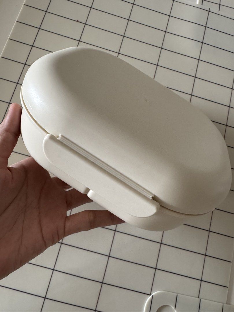 Preloved Mushie Bento Box with Fork and Spoon (Category: Food Organization & Storage) located in Manila. Submitted by helloseptembermnl (Listing ID 1467364615, Image 2). Description: - Authentic Mushie Lunch Box (Made in Denmark) - Color: Cream - Includes matching spoon and fork that securely clip into the lid - 3 divided compartments to keep foods separate - Microwave safe up to 100°C (for reheating only, not cooking) - Practical bento-style des