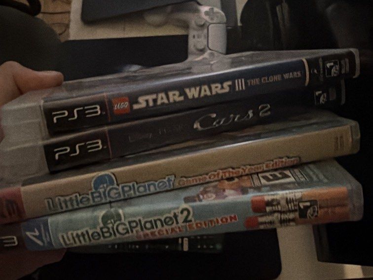 PS3 Games Bundle (Category: PlayStation) located in Manila. Submitted by mchgtnc (Listing ID 1467587923, Image 2). Description: - PS3 game stack bundle - Includes: God of War 3 & Ascension, Grid 1 & 2, Skyrim, Need for Speed Rivals & The Run, Transformers, BlazBlue, Plants vs Zombies Garden Warfare, and Disney Infinity, Tekken Tag Tournament 2, LittleBiGPlanet 1 & 2, Lego Star Wars: The Clone Wars, Cars 2 - All games come with their original case