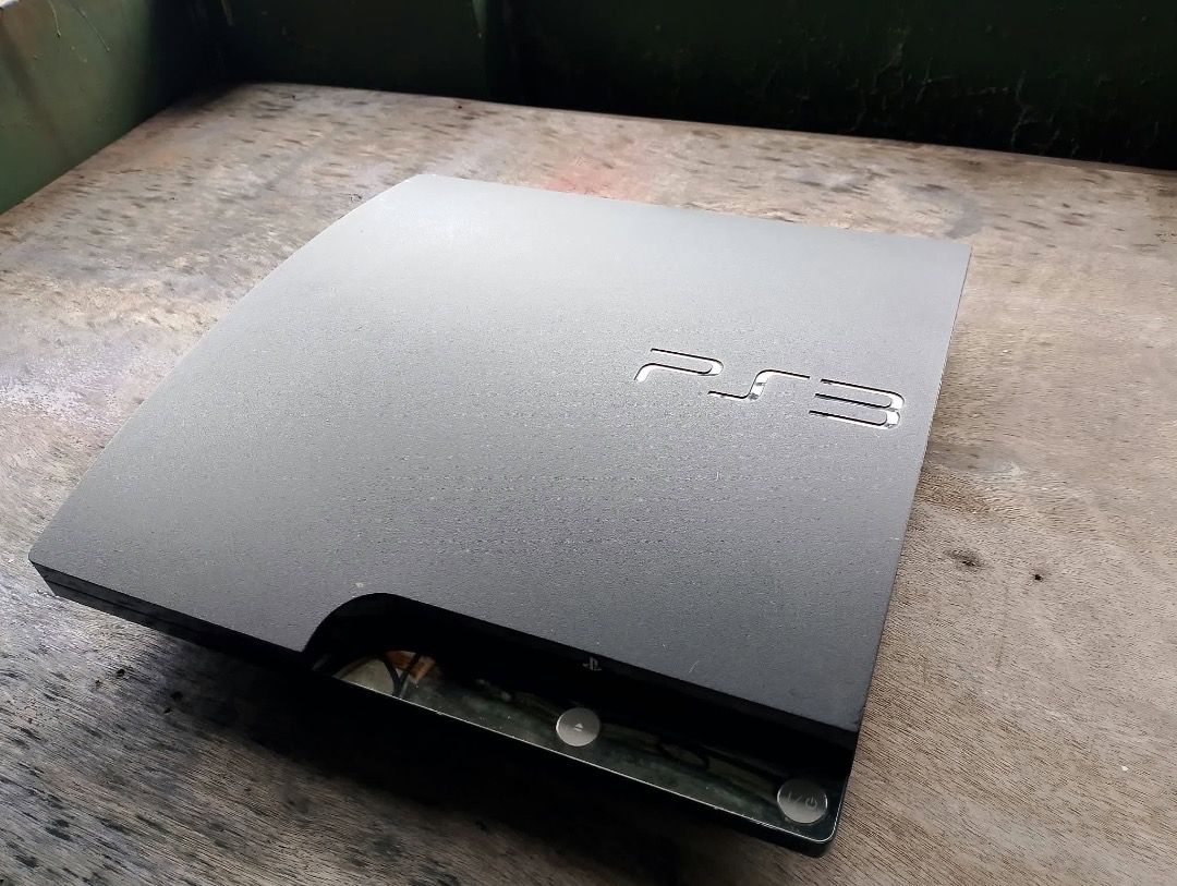 PS3 Slim 320gb w/ box - JB (Category: PlayStation) located in Manila. Submitted by clevertree.fdbff1 (Listing ID 1467496591, Image 2). Description: PS3 Slim 320gb w/ box - JB - with approximately 50 games installed (dm for list) - power cable and usb cable included - will throw in 4 original PS3 controllers if u want (3 of them can be turned on and charge but w/ issue - constant button press, 1 wont turn on) - you can also have the God of War 3 C