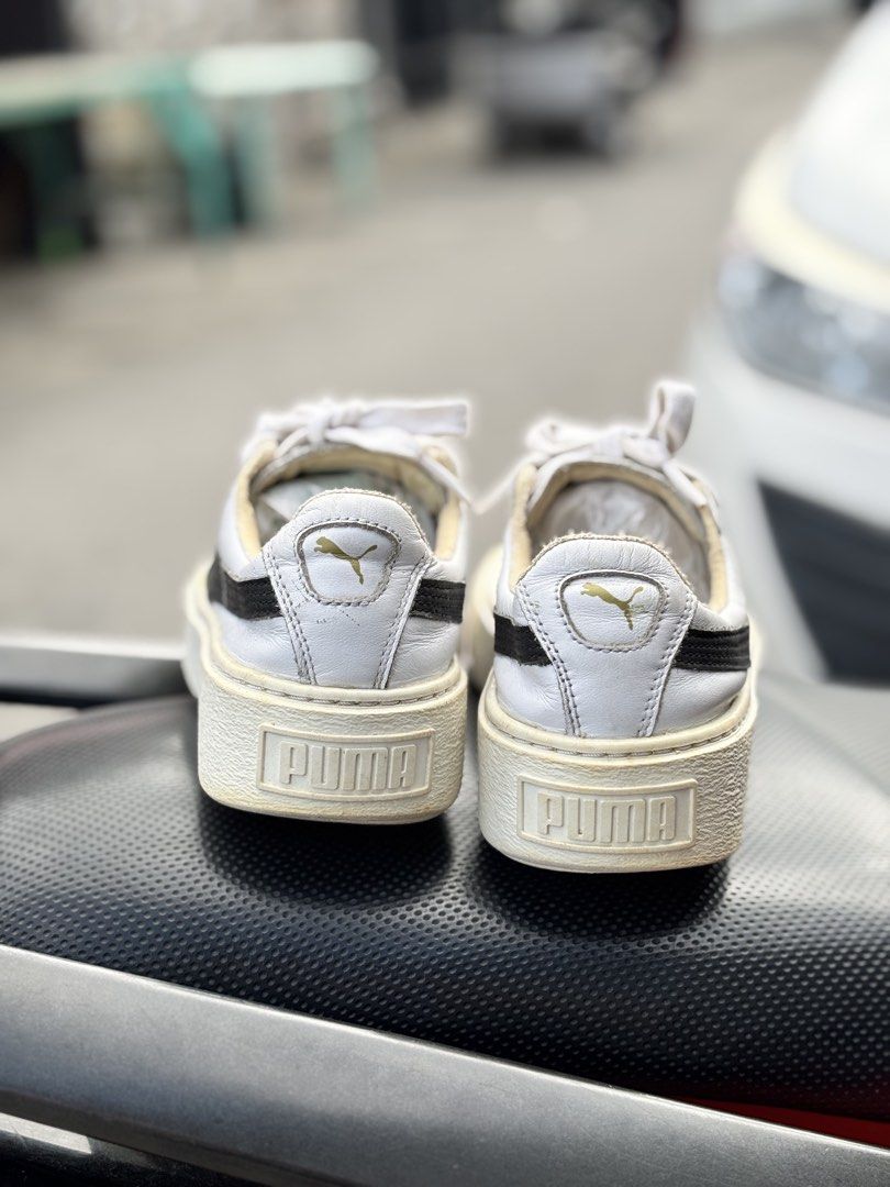 Puma Basket Platform Sneakers (Category: Sneakers) located in San Fernando. Submitted by kickslocker (Listing ID 1467379599, Image 3). Description: - Brand: Puma - Style: Platform sneakers - Color: White and black - Size: Women's US 5.5 (22cm) - Material: Leather upper with chunky ribbed rubber sole - Details: Gold branding on side and heel, includes original white laces - Condition: Excellent, clean soles and uppers with minimal signs of wear.