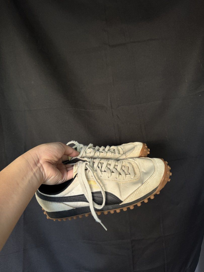 Puma Fast Rider Sneakers (Category: Sneakers) located in Manila. Submitted by meegy (Listing ID 1467440300, Image 1). Description: - Brand: Puma Fast Rider -unworn - Colorway: Cream, white, and black - Material: Fabric upper with suede panels on the toe and heel - Sole: Textured gum rubber outsole with prominent studded treads - Closure: Standard lace-up front - Condition: Clean, ready-to-wear condition with minimal wear on the soles.