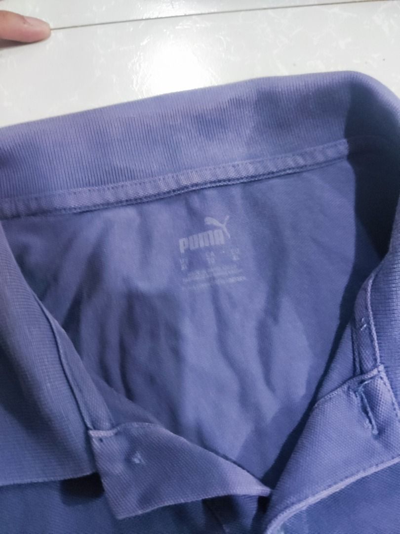 Puma Navy Blue Polo Shirt (Category: Tshirts & Polo Shirts ) located in Rizal. Submitted by skilidilidu (Listing ID 1467548069, Image 2). Description: - Brand: Puma - Color: Navy Blue - Style: Classic collar with button placket - Logo: White embroidered logo on the chest - Origin: Made in Bangladesh - Condition: Clean inside and out, comfortable for everyday wear.