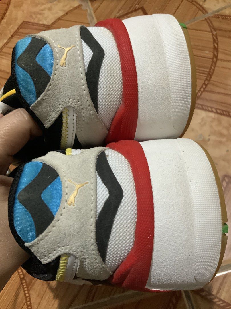 Puma RS-X Multicolour Sneakers (Category: Sneakers) located in Caloocan City. Submitted by Twinsters_2nd (Listing ID 1467368751, Image 3). Description: - Brand: Puma RS-X - Style: Chunky retro silhouette with a bold multicolour design - Colorway: White mesh base, black overlays, red/blue accents, and yellow/green outsole details - Details: White laces with gold tips and Puma branding patch on the tongue - Sole: Gum sole with clean bottoms and min