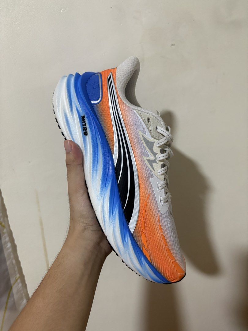 Puma Velocity Nitro 4 Ekiden Running Shoes (Category: Sneakers) located in San Fernando. Submitted by migyspreloved_ (Listing ID 1467461049, Image 1). Description: - Brand: Puma - Model: Velocity Nitro 3 (Ekiden Colorway) - Color: White, orange, and vibrant blue gradient - Condition: Brand new - Cushioning: Nitro foam midsole for ultimate comfort - Outsole: Pumagrip rubber for superior traction - Packaging: Complete with original Puma shoe box Is