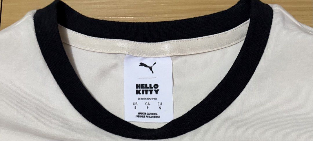 Puma x Hello Kitty Croptop Shirt Small (Category: Shirts) located in Quezon City. Submitted by beckyshop2024 (Listing ID 1467418558, Image 2). Description: - Used once - In mint condition - From Puma Retail Store - Color: Cream.