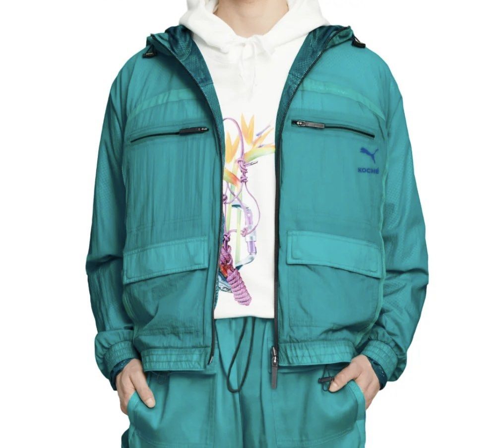 PUMA x KOCHÉ collaboration (Category: Coats, Jackets and Outerwear) located in Manila. Submitted by -handpick- (Listing ID 1467476267, Image 2). Description: PUMA x KOCHÉ collaboration, a capsule collection that fuses Parisian couture craftsmanship with athletic sportswear. Both pieces feature a distinct, mineral-inspired crystal print on turquoise mesh. Size : US Small Dimensions : Top Length 26.5 inches Width 20 inches Bottom : Length : 22 inch