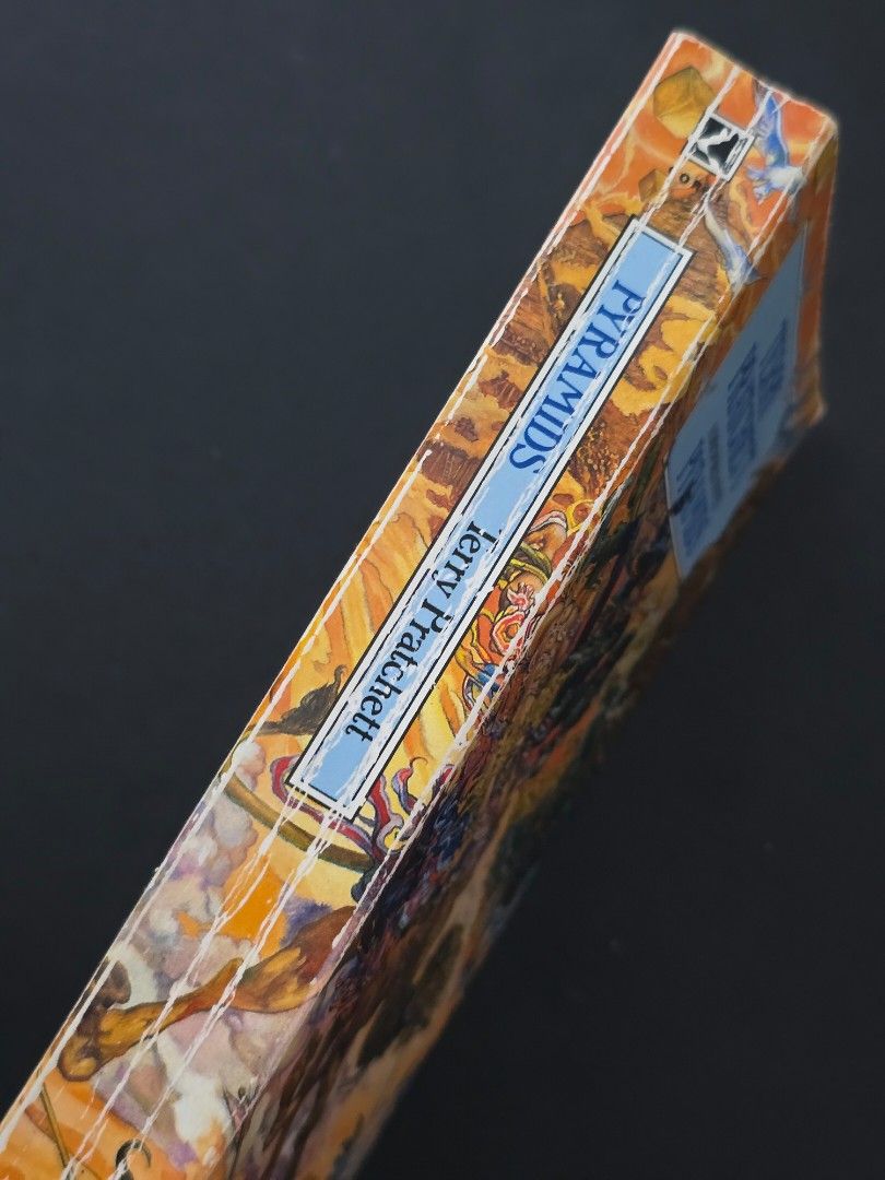 Pyramids by Terry Pratchett (Mass Market Paperback) (Category: Storybooks) located in Dasmarinas. Submitted by curatedreadsbykat (Listing ID 1467376905, Image 2). Description: ✨ Secondhand ✨ This is a preloved copy so kindly manage your expectations. May have flaws like dents, tanning, foxing, writings, etc. ✨ Kindly swipe left on the picture section of the listing to see the condition of the book..