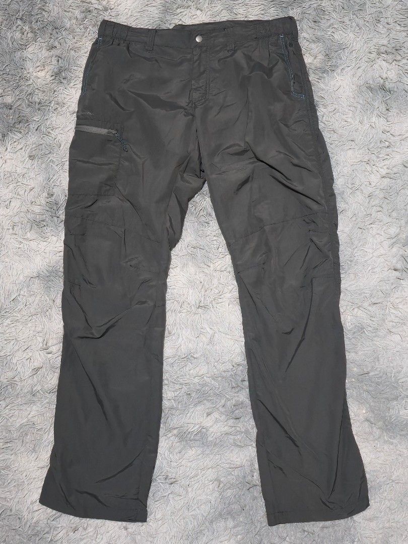 Quechua Hiking Trekking Pants Charcoal Grey (Category: Trousers) located in Abulug. Submitted by humanwhosellthings (Listing ID 1467366603, Image 1). Description: DECATHLÒN QUECHUA Hiking Pants ✅Excellent Condition ✅Issue: none ▫️Waist Size: 34-38 ▫️Length: 42 - Color: Charcoal grey - Fit: Straight leg with elastic waistband and belt loops - Storage: Zippered thigh pocket with printed logo - Material: Lightweight synthetic - Condition: Clean, no 