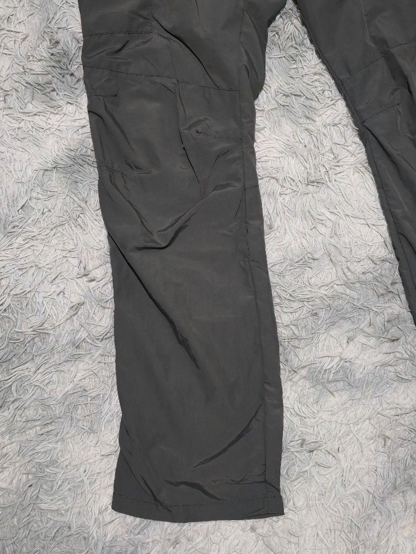 Quechua Hiking Trekking Pants Charcoal Grey (Category: Trousers) located in Abulug. Submitted by humanwhosellthings (Listing ID 1467366603, Image 3). Description: DECATHLÒN QUECHUA Hiking Pants ✅Excellent Condition ✅Issue: none ▫️Waist Size: 34-38 ▫️Length: 42 - Color: Charcoal grey - Fit: Straight leg with elastic waistband and belt loops - Storage: Zippered thigh pocket with printed logo - Material: Lightweight synthetic - Condition: Clean, no 