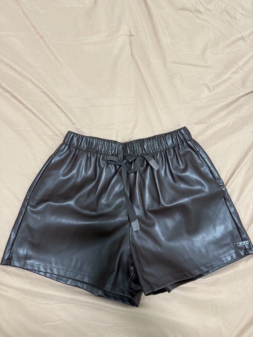 RAF Aspen Shorts Brown Size M (Category: Shorts) located in Quezon City. Submitted by preloved.lux15 (Listing ID 1467558204, Image 3). Description: - Brand/Model: RAF Aspen Shorts - Color: Brown - Material: Soft faux leather - Size: Medium - Waistband: Elastic with front drawstring - Details: Metal R.A.F brand tag near hem - Fit: Comfortable pull-on style.