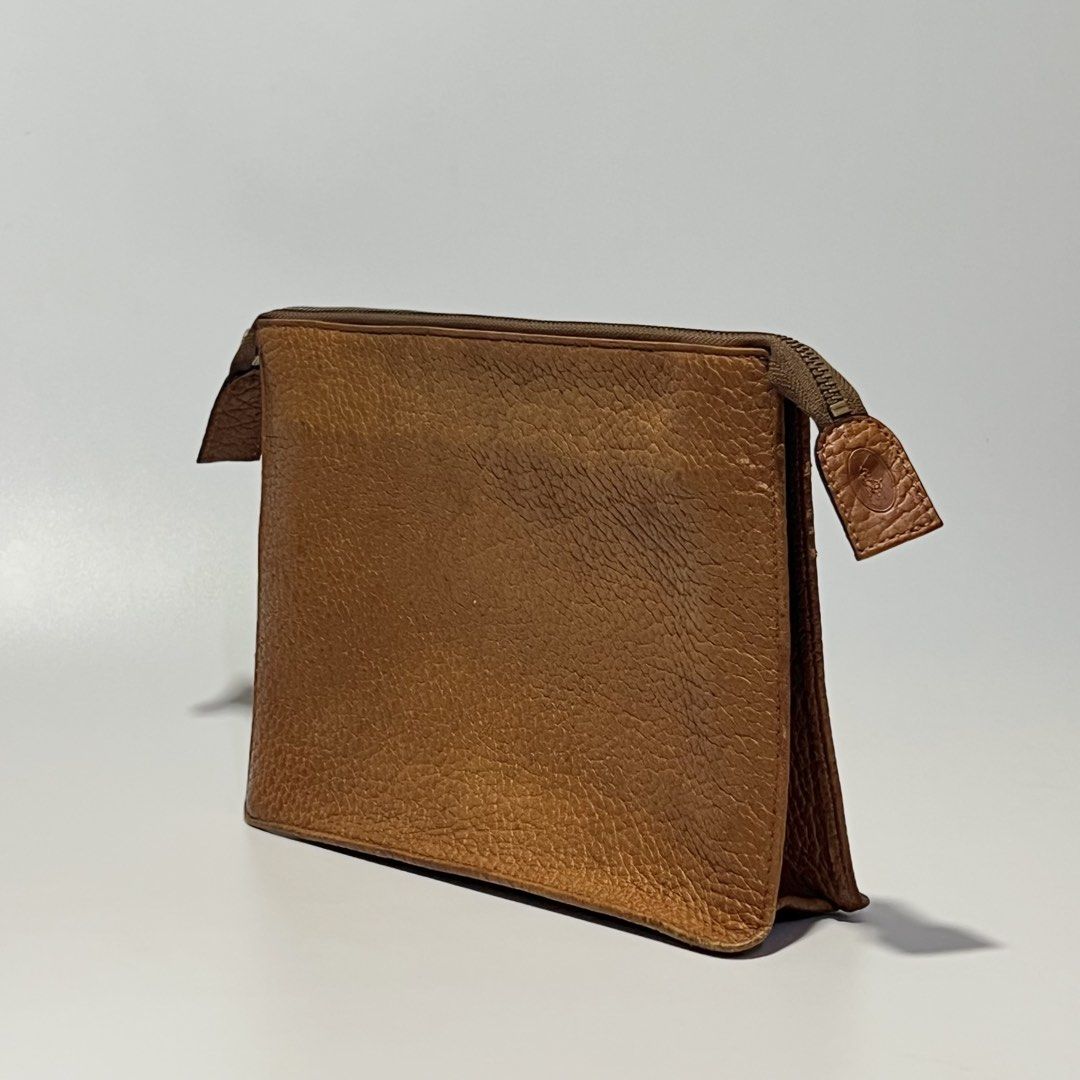 Ralph Lauren Clutch Bag (Category: Belt bags, Clutches and Pouches) located in San Pedro. Submitted by strt.manila (Listing ID 1467591267, Image 1). Description: Ralph Lauren Clutch Bag Dual Zipper inside Minor scratches on the side (can provide photos) Minor ballpen stain inside.