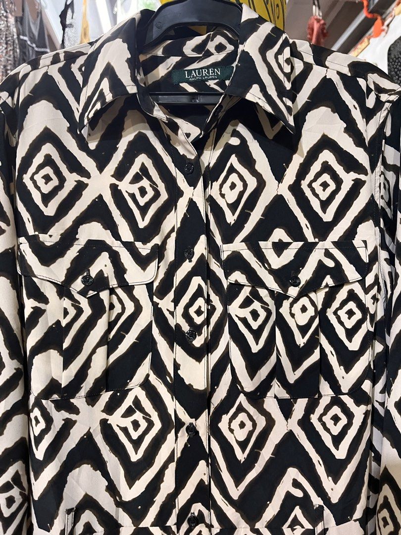 Ralph Lauren Geometric Diamond Print (Category: Dresses) located in Valencia. Submitted by hunterxthrifter (Listing ID 1467379331, Image 3). Description: • Black & beige geometric pattern • Button-up front with collar • Long sleeves with button cuffs • Two front flap pockets • 100% polyester • Made in China • Size: 150/80A .
