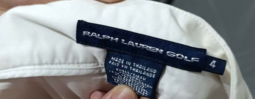 Ralph Lauren Golf White Skort Size 4 (Category: Skirts) located in Paranaque City. Submitted by abbethany1306 (Listing ID 1467486687, Image 2). Description: - Brand: Ralph Lauren Golf - Style: White Skort - Size: 4 - Condition: Crisp, clean, and versatile for golf or casual wear - Comfort: Built-in shorts underneath for added coverage and ease of movement - Details: Back welt pockets accented with chic gold-tone hardware - Origin: Made in Thailan