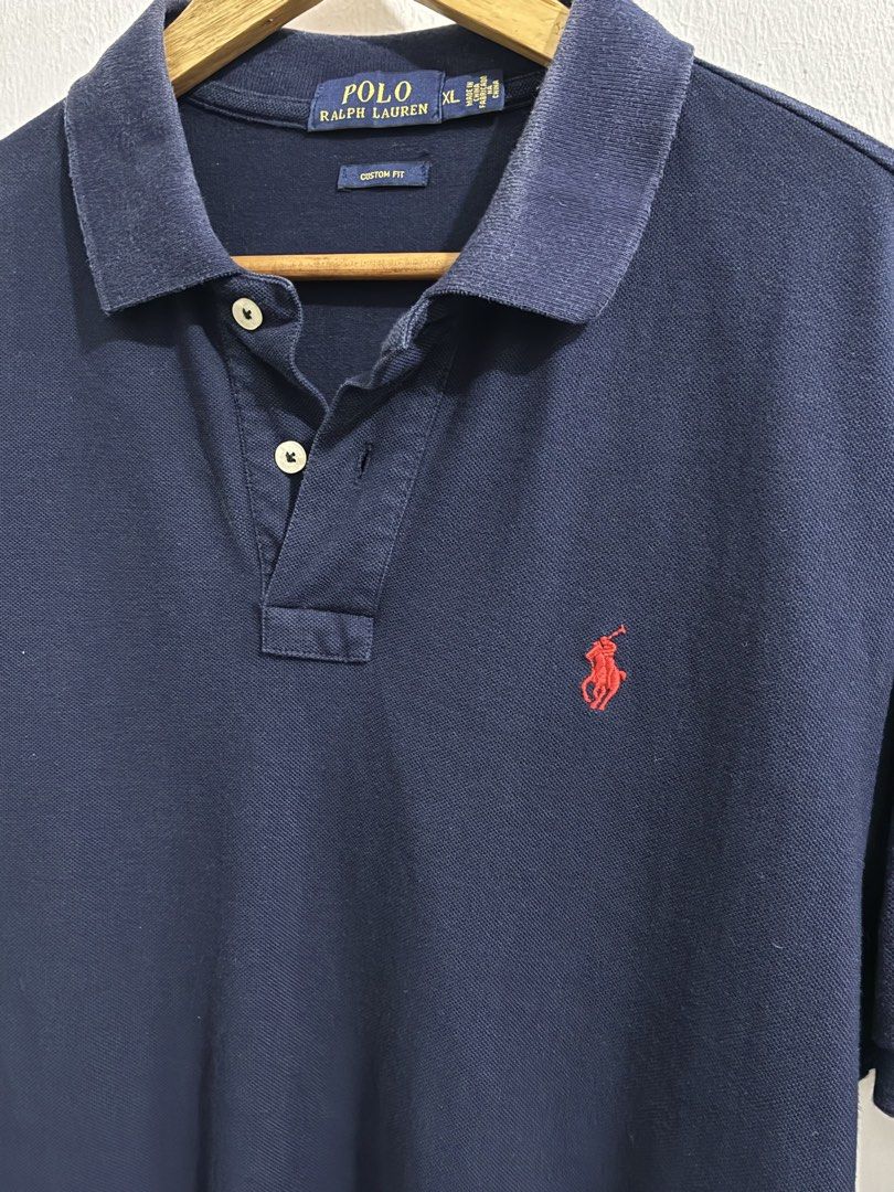 Ralph Lauren Polo Navy (Category: Tshirts & Polo Shirts ) located in San Mateo. Submitted by coertee (Listing ID 1467511983, Image 2). Description: Ralph Lauren Polo Navy Blue Size : XLarge Excellent Condition Color Rate : 9/10 (color may vary due to lighting) No issues at all only wore this a couple of times, pretty much a perfect wear for dates. very nice color, no issues with it a bit of fading from the collar but other than that it's all good