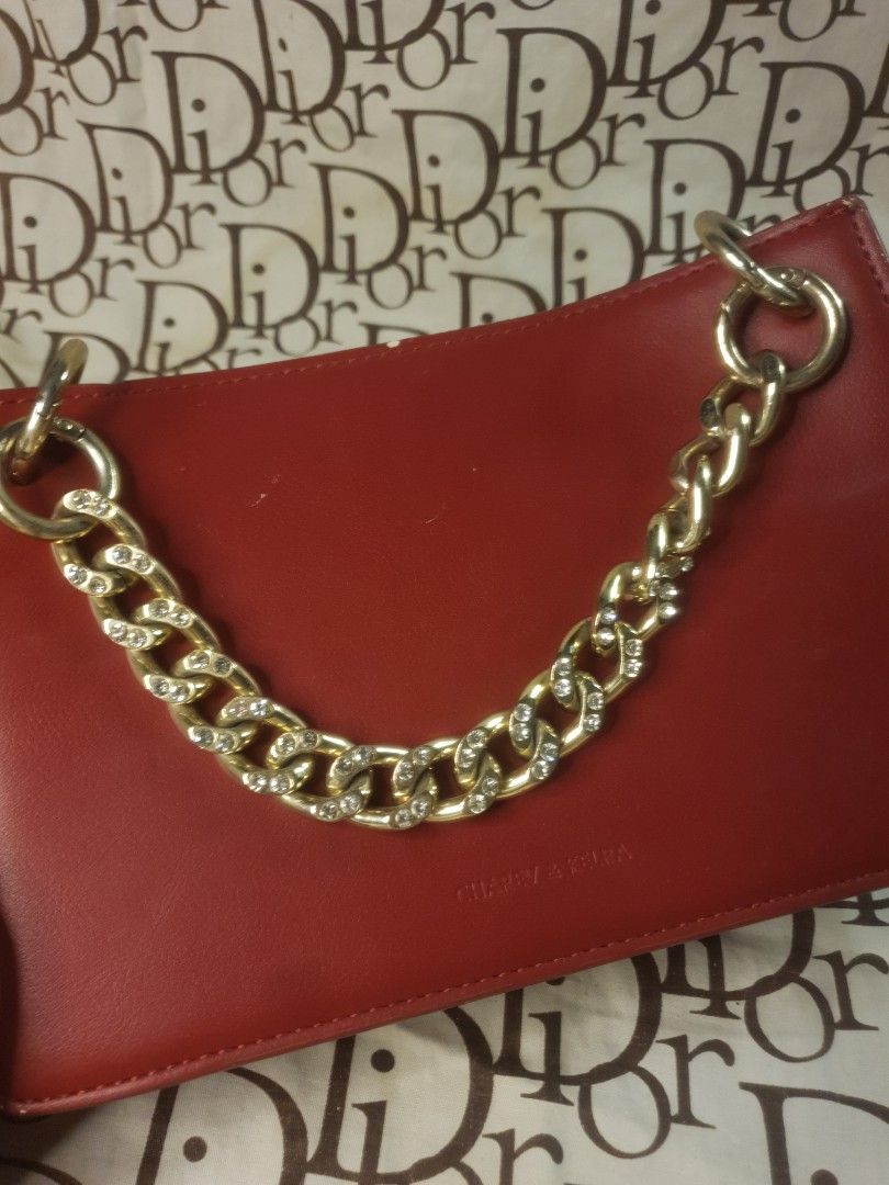 Random Red Clutch bag (Category: Clutches) located in San Fernando. Submitted by retro.district. (Listing ID 1467524645, Image 2). Description: Decluttering bags RFS: MOM NEEDS TO FREE UP SOME SPACE IN HER CLOSET - Random red clutch bag - Condition: Excellent (Rank A) - No issue - Color Rate: 9.5/10.