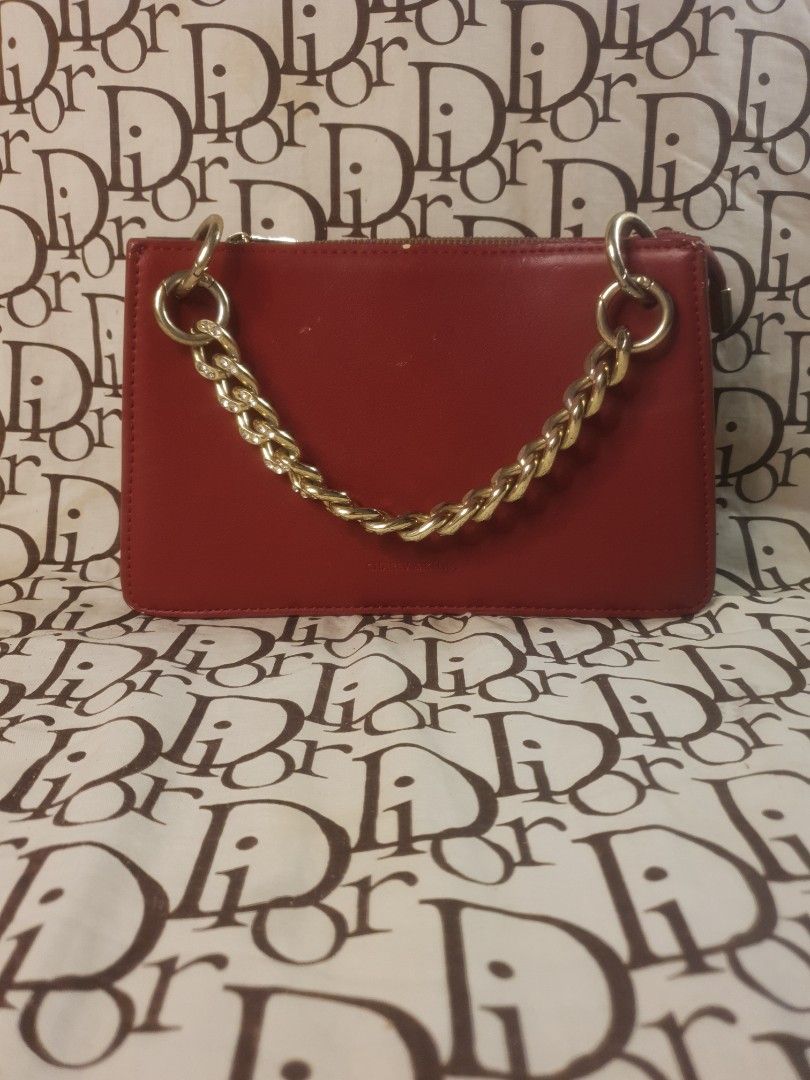 Random Red Clutch bag (Category: Clutches) located in San Fernando. Submitted by retro.district. (Listing ID 1467524645, Image 1). Description: Decluttering bags RFS: MOM NEEDS TO FREE UP SOME SPACE IN HER CLOSET - Random red clutch bag - Condition: Excellent (Rank A) - No issue - Color Rate: 9.5/10.