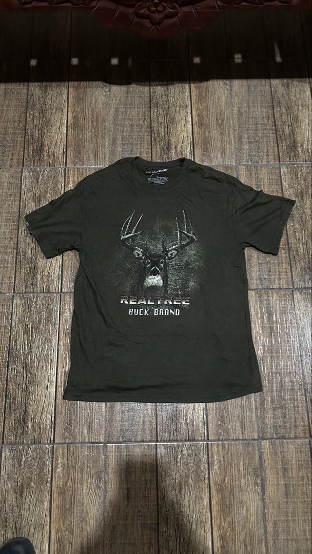 REALTREE T SHIRT (Category: Tshirts & Polo Shirts ) located in Manila. Submitted by urban.vintage (Listing ID 1467562749, Image 1). Description: ISSUE: NONE (NEED WASH) MOP :GCASH (NO COD) SHIP VIA: LALAMOVE & J&T LOCATION: PASIG CITY LENGTH: 28 WIDTH : 22.