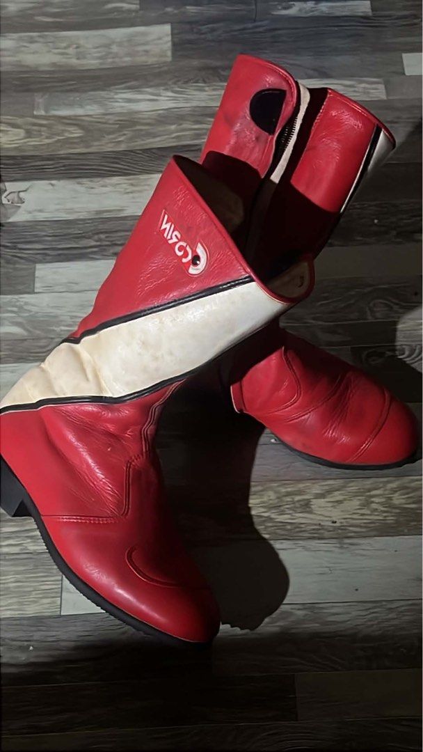 Red and White Leather Motorcycle Riding Boots (Category: Boots) located in Tagum. Submitted by midolli (Listing ID 1467510219, Image 1). Description: - Material: Genuine leather in red and white with black contrast piping - Design: Tall shaft motorcycle boots with inner zippers for easy wear - Protection: Rounded toes and shift patch reinforcement on the left foot - Soles: Sturdy heels and durable rubber outsoles - Condition: Pre-owned with a wor