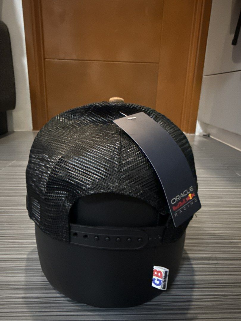 Red Bull Racing New Era Trucker Cap (Category: Caps & Hats) located in Quezon City. Submitted by noelc23 (Listing ID 1467484111, Image 3). Description: - Authentic New Era Oracle Red Bull Racing trucker hat with original tags still attached - Breathable black mesh back with an adjustable snapback closure for a custom fit.
