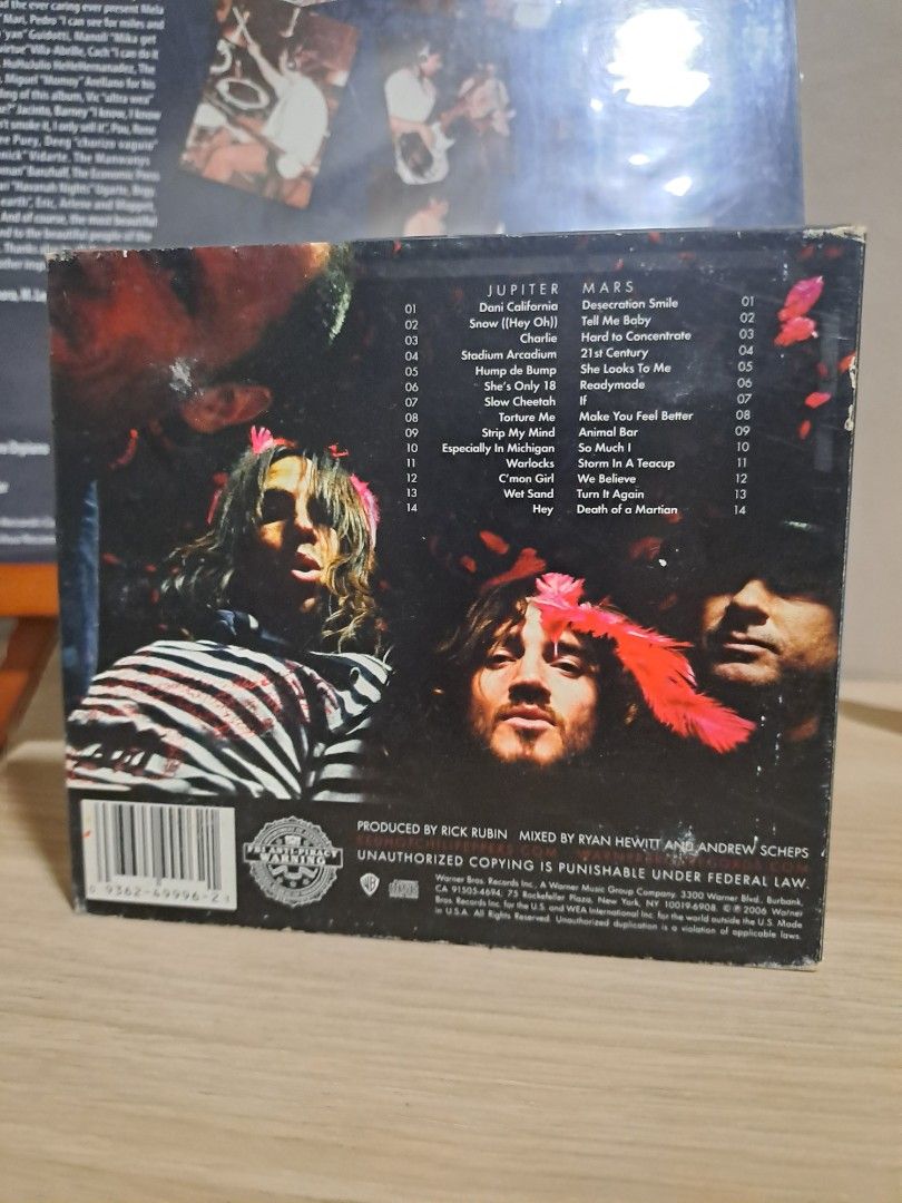 Red Hot Chili Peppers Stadium Arcadium CD (Category: CDs & DVDs) located in Las Pinas. Submitted by cobieshop (Listing ID 1467498604, Image 2). Description: Red Hot Chili Peppers double album Stadium Arcadium. Includes two discs covering Jupiter and Mars tracks. Jewel case shows some edge wear and scuffs from storage. Full tracklist printed on the back cover with band member photos..