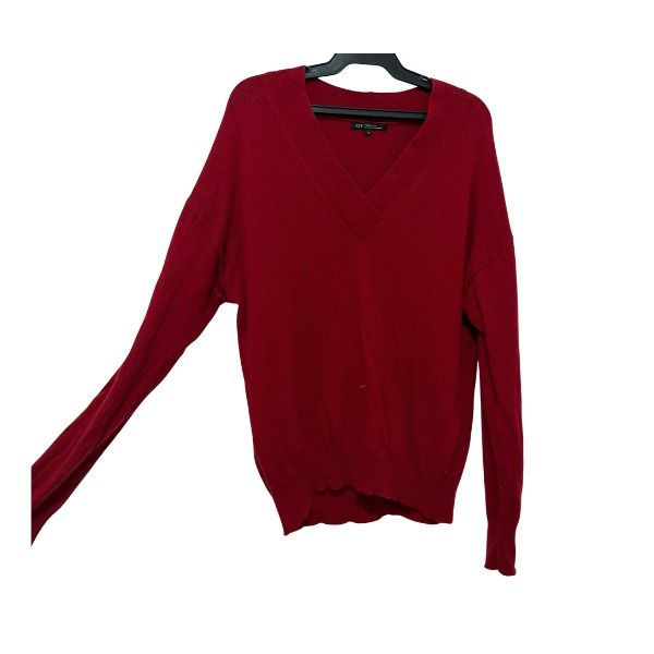 Red V-Neck Knit Sweater (Category: Coats, Jackets and Outerwear) located in San Fernando. Submitted by lovingthings1 (Listing ID 1467410396, Image 2). Description: - Color: Deep red - Neckline: Relaxed v-neck - Fit: Relaxed with drop shoulders - Sleeves: Long sleeves with ribbed cuffs - Material: Soft knitted fabric - Style: Clean back design, perfect for cooler weather.