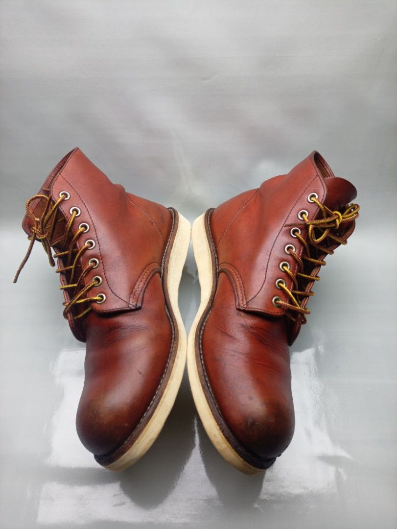 Red Wing 8166 Boots US 9.5 UK 8.5 (Category: Boots) located in Dasmarinas. Submitted by ziapatos (Listing ID 1467598610, Image 3). Description: Red Wing 8166 heritage work boots in reddish brown leather. Size US 9.5, UK 8.5, EUR 42.5. Insole measures 27.5 cm. Classic design with yellow and brown braided laces. Goodyear welt construction on white traction tred wedge soles. Tongue label displays model number and sizing details. Natural creasing on 
