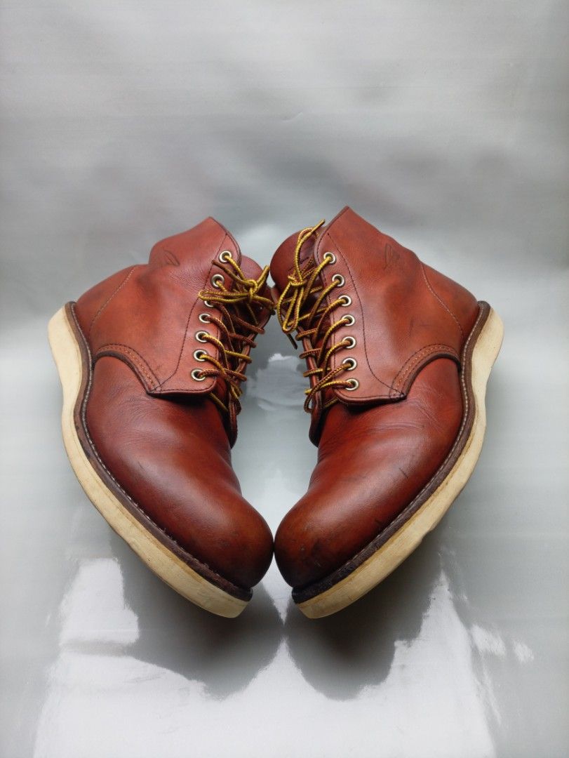 Red Wing 8166 Boots US 9.5 UK 8.5 (Category: Boots) located in Dasmarinas. Submitted by ziapatos (Listing ID 1467598610, Image 2). Description: Red Wing 8166 heritage work boots in reddish brown leather. Size US 9.5, UK 8.5, EUR 42.5. Insole measures 27.5 cm. Classic design with yellow and brown braided laces. Goodyear welt construction on white traction tred wedge soles. Tongue label displays model number and sizing details. Natural creasing on 