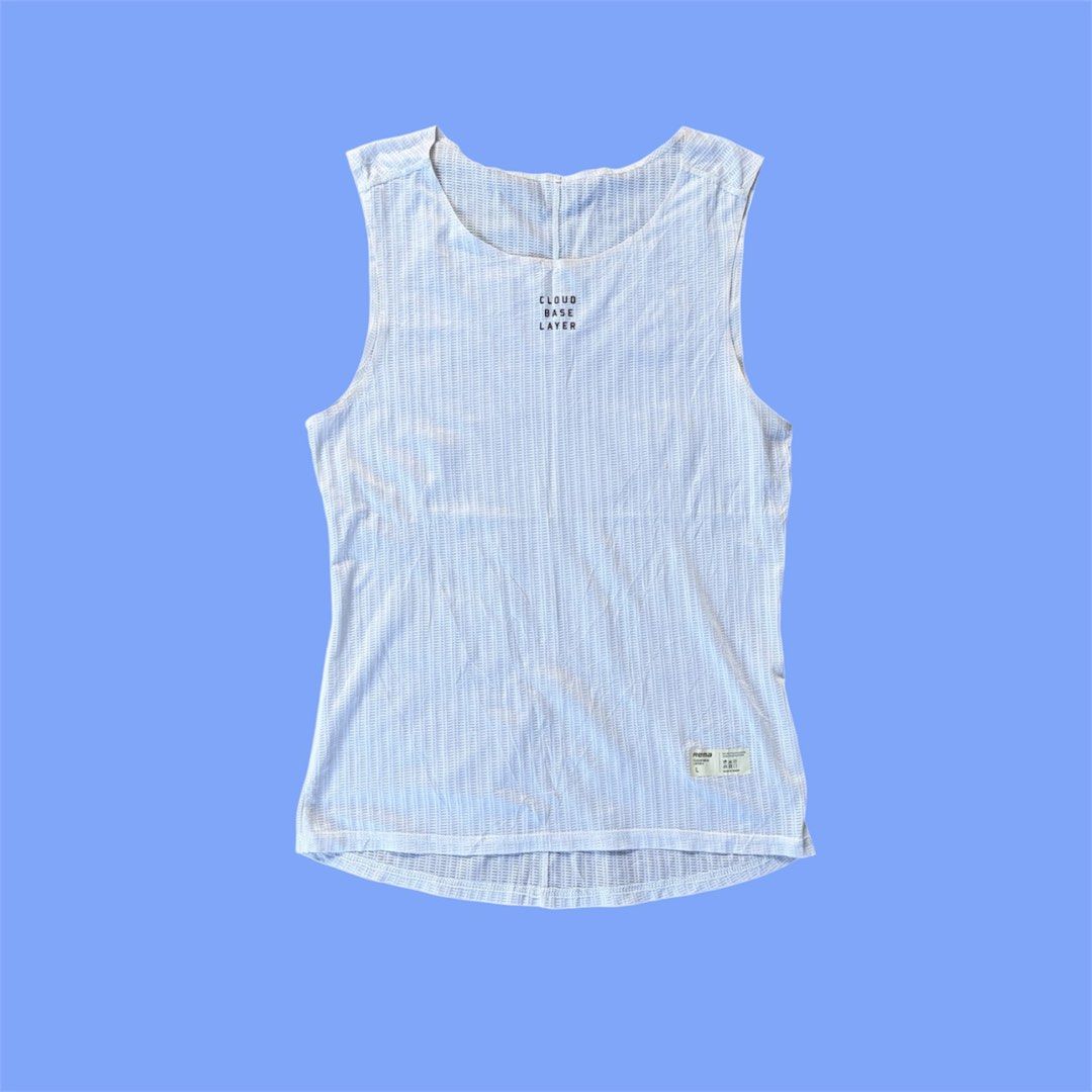 Rema Cloud Base Layer 4 Tank Top White (Category: Activewear) located in Iloilo. Submitted by raeshel (Listing ID 1467485511, Image 1). Description: Dimension : W 15.5’ L 23’ - Brand: Rema Cloud Base Layer 4 - Color: White - Size: L - Material: 93% recycled polyester, 7% recycled elastane - Fabric: Lightweight ribbed mesh, highly breathable activewear - Details: Printed text branding on chest and bottom hem label patch.