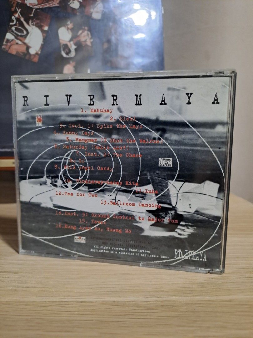 Rivermaya Atomic Bomb CD Album (Category: CDs & DVDs) located in Las Pinas. Submitted by cobieshop (Listing ID 1467513948, Image 2). Description: - Item: Original Rivermaya Atomic Bomb Audio CD (NMINT!) -Inlay (Mint) - Label: BMG Records Philippines (Classic OPM Alternative Rock) - Inclusions: Jewel case, back insert with full tracklist, and booklet - Condition: Disc surface is clean and plays properly; case shows minor shelf wear from storage - 