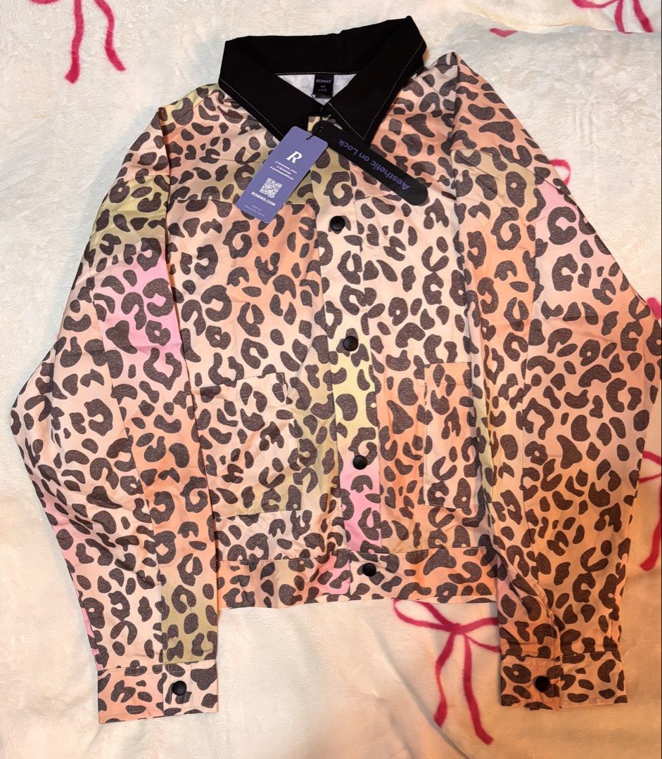 ROMWE Leopard Print Button-Up Jacket (Category: Coats, Jackets and Outerwear) located in Bacoor. Submitted by dangeusebio1515 (Listing ID 1467403754, Image 1). Description: - Brand: ROMWE - Style: Pastel leopard print jacket - Size: Medium - Condition: Brand new with original tags attached - Details: Contrast black collar with white stitching, front button closure, and two chest pockets.