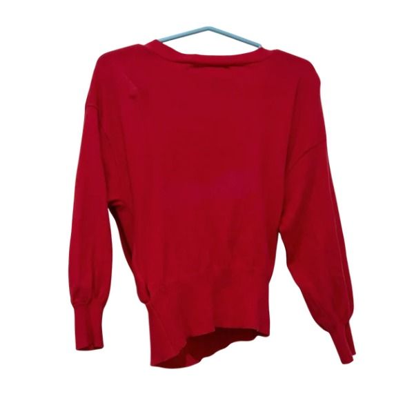 ROYAL PARTY Red Wrap Knit Sweater (Category: Longsleeves) located in San Fernando. Submitted by lovingthings1 (Listing ID 1467404022, Image 3). Description: - Brand: Royal Party - Color: Bright red - Style: V-neck wrap front with long balloon sleeves, ribbed cuffs, and hem - Size: Free size - Material: 72% Rayon, 28% Polyester (super soft texture) - Condition: Excellent / Like new - Perfect for: Casual wear, colder days, or air-conditioned rooms.