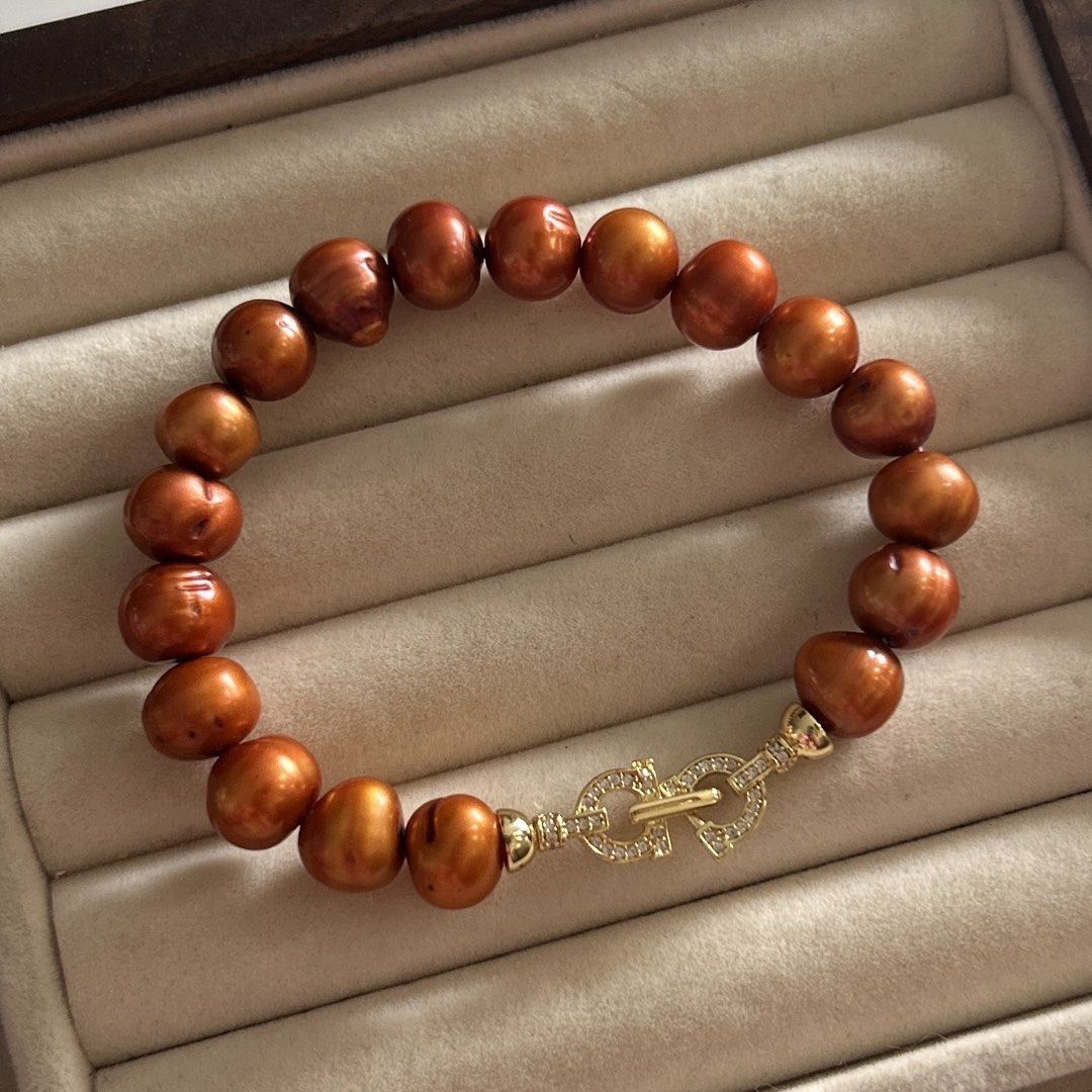 Rust orange color pearl bracelet (Category: Bracelets) located in Lipa City. Submitted by avenueusco_ph (Listing ID 1467407923, Image 2). Description: Rust color pearl bracelet 🧡 Rare color ✨ Nice luster 🦪 10.4mm 8” long Only 1.