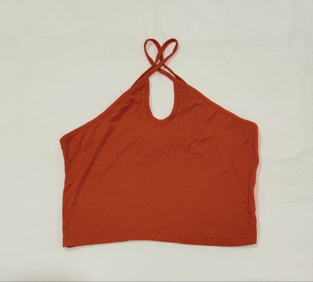 Rust Orange Crisscross Halter Crop Top (Category: Sleeveless) located in Pasig City. Submitted by mxvxt (Listing ID 1467468015, Image 2). Description: 〰 brand new, never been used 〰 fits XS-S frame 〰 lightweight and breathable fabric 〰 cute & dainty european summer or party top! 〰 rfs: decluttering .