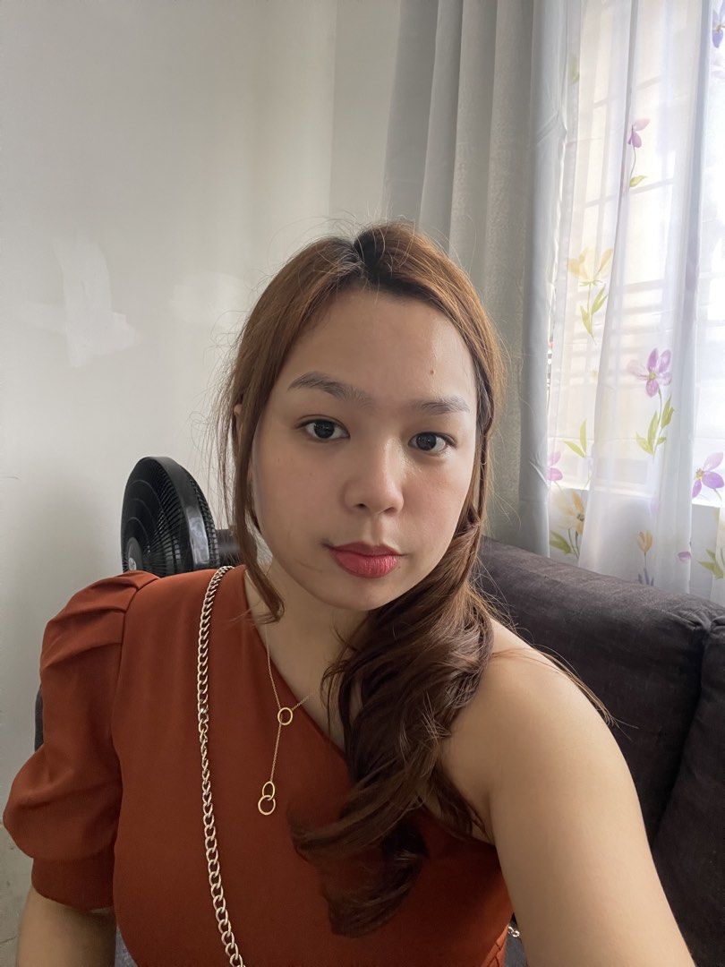 Rust orange midi dress with side slit (Category: Dresses) located in Valenzuela. Submitted by criszaconcepcion (Listing ID 1467539022, Image 2). Description: - Color: Rust orange - Style: Midi dress with puff sleeves, fitted bodice, and side slit - Length: Knee-length.
