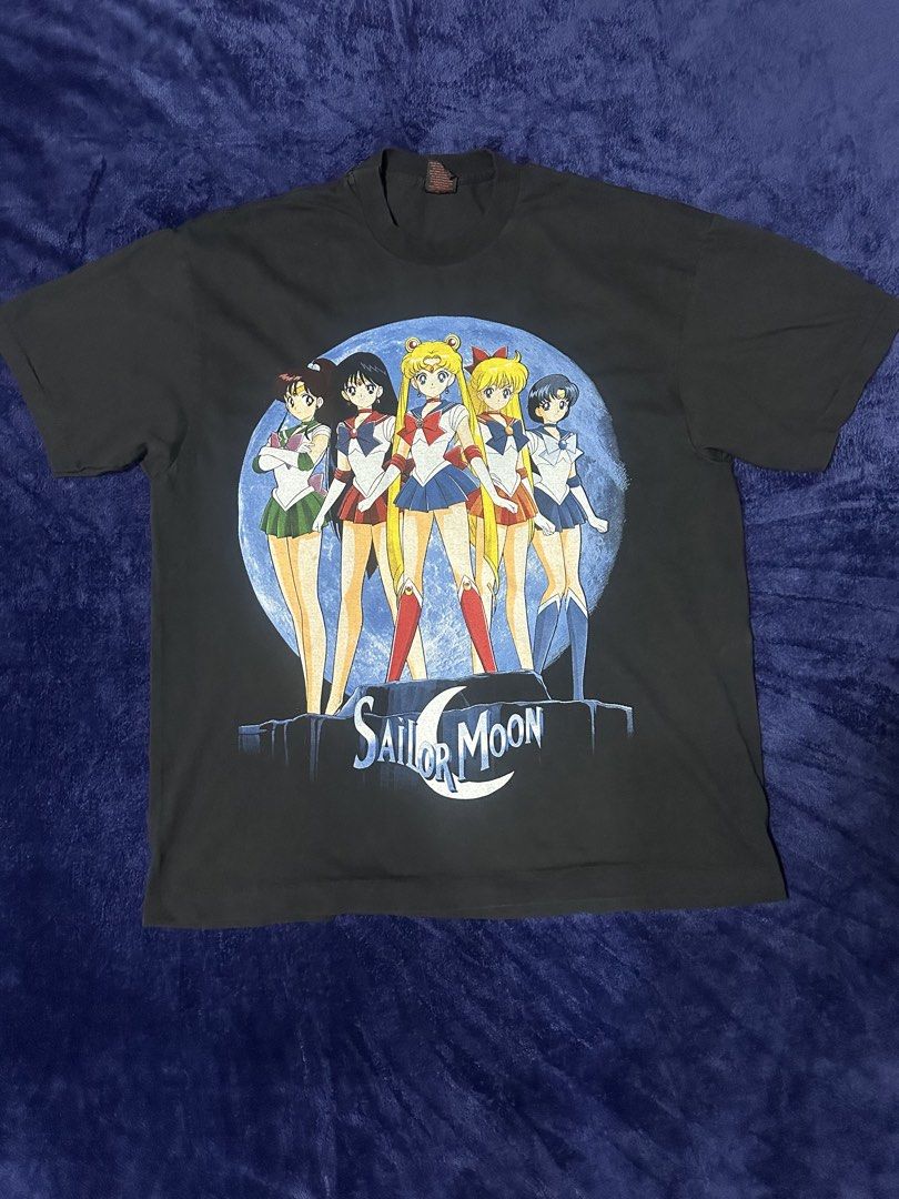 Sailor Moon T-Shirt (Category: Tshirts & Polo Shirts ) located in Quezon City. Submitted by rackculture (Listing ID 1467389038, Image 1). Description: 👕 Size XL 23 width 29 length 🧵 Single Stitch All the Way 🏷️ Fashion Victim on Tag ₱ 1,500 only 📩 Message us for more details .