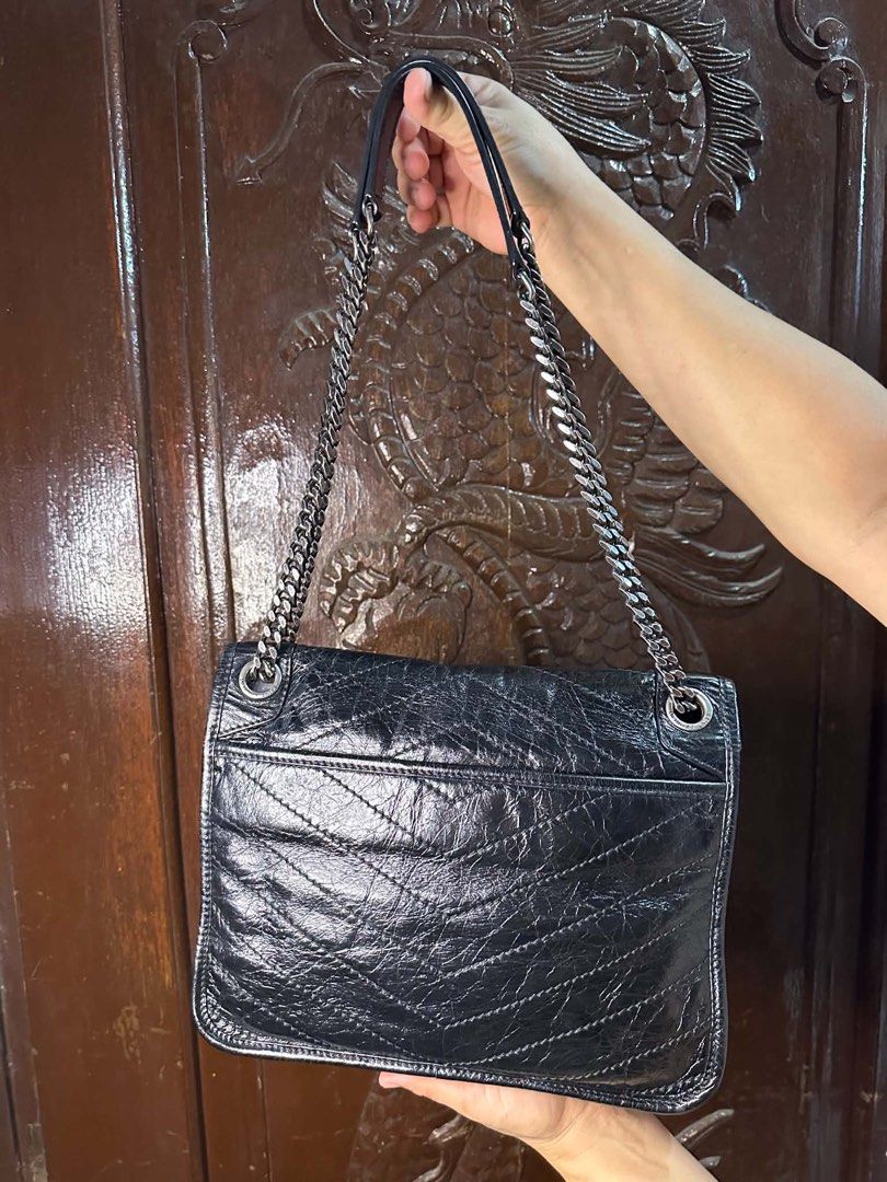 Saint Laurent College Monogram Chain Bag Black (Category: Luxury Bags & Wallets) located in Manila. Submitted by jxmievicto12443 (Listing ID 1467490652, Image 2). Description: - Brand: Saint Laurent College Bag - Material: Black crinkled leather with silver-tone hardware - Hardware: Iconic YSL front monogram - Closure: Magnetic snap closure - Interior: Fabric lining with zip pocket - Exterior: Convenient slip pocket on the back - Origin: Made in 