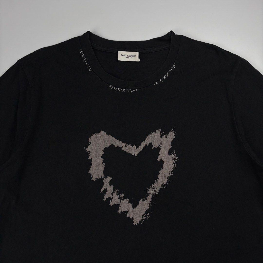 Saint Laurent Heart Tshirt (Category: Luxury Apparel) located in Bacolod City. Submitted by cast.archives (Listing ID 1467571113, Image 2). Description: Saint Laurent Heart Tshirt Size: Large Condition: Very good Flaw: Sign of used.