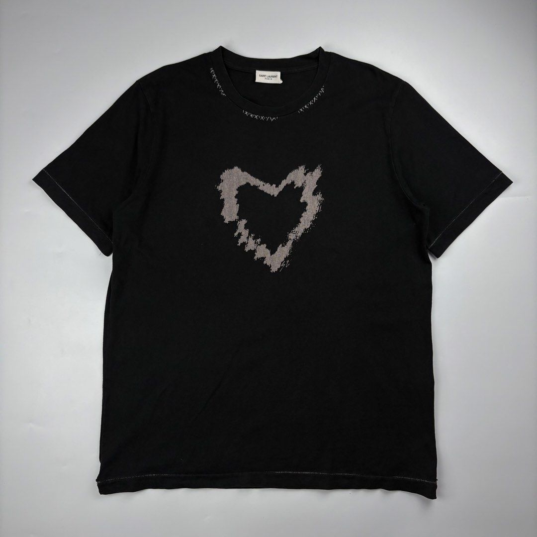 Saint Laurent Heart Tshirt (Category: Luxury Apparel) located in Bacolod City. Submitted by cast.archives (Listing ID 1467571113, Image 1). Description: Saint Laurent Heart Tshirt Size: Large Condition: Very good Flaw: Sign of used.