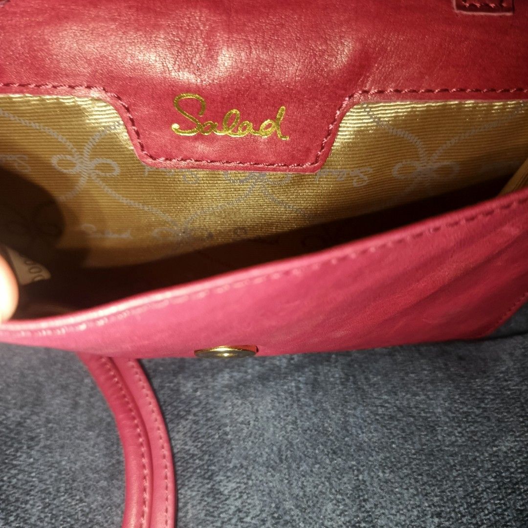 Salad wallet sling bag (Category: Luxury Bags & Wallets) located in Urdaneta. Submitted by bernalyn25 (Listing ID 1467393265, Image 3). Description: -Cute size wallet size sling bag - Detachable strap - Can be worn as clutch or wallet - Fuchsia color4 - Like new!.