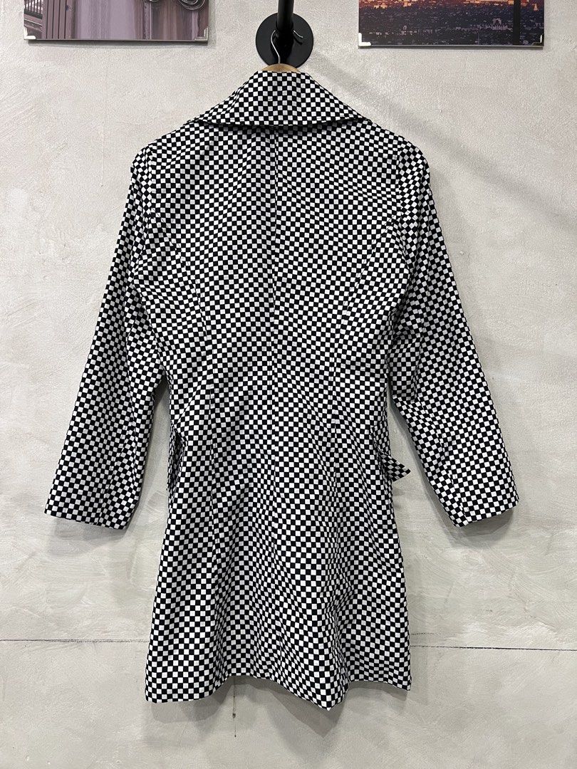 Sandro Paris checkerboard double-breasted trench coat. (Category: Coats, Jackets and Outerwear) located in Manila. Submitted by -handpick- (Listing ID 1467476890, Image 2). Description: Sandro Paris black and white checkerboard double-breasted trench coat. Size : 38 Dimensions : Length : 33.5 inches Width : 18 inches Shoulder : 15 inches Sleeve : 23 inches Sign of wear in good condition .