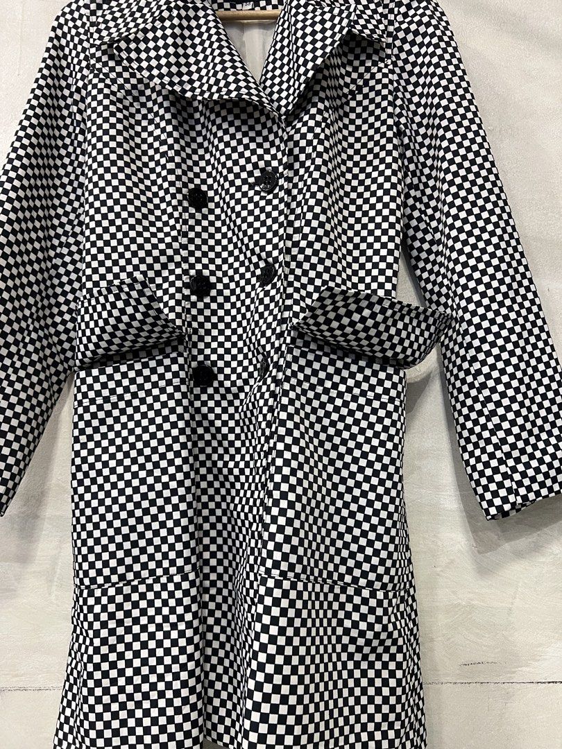 Sandro Paris checkerboard double-breasted trench coat. (Category: Coats, Jackets and Outerwear) located in Manila. Submitted by -handpick- (Listing ID 1467476890, Image 3). Description: Sandro Paris black and white checkerboard double-breasted trench coat. Size : 38 Dimensions : Length : 33.5 inches Width : 18 inches Shoulder : 15 inches Sleeve : 23 inches Sign of wear in good condition .