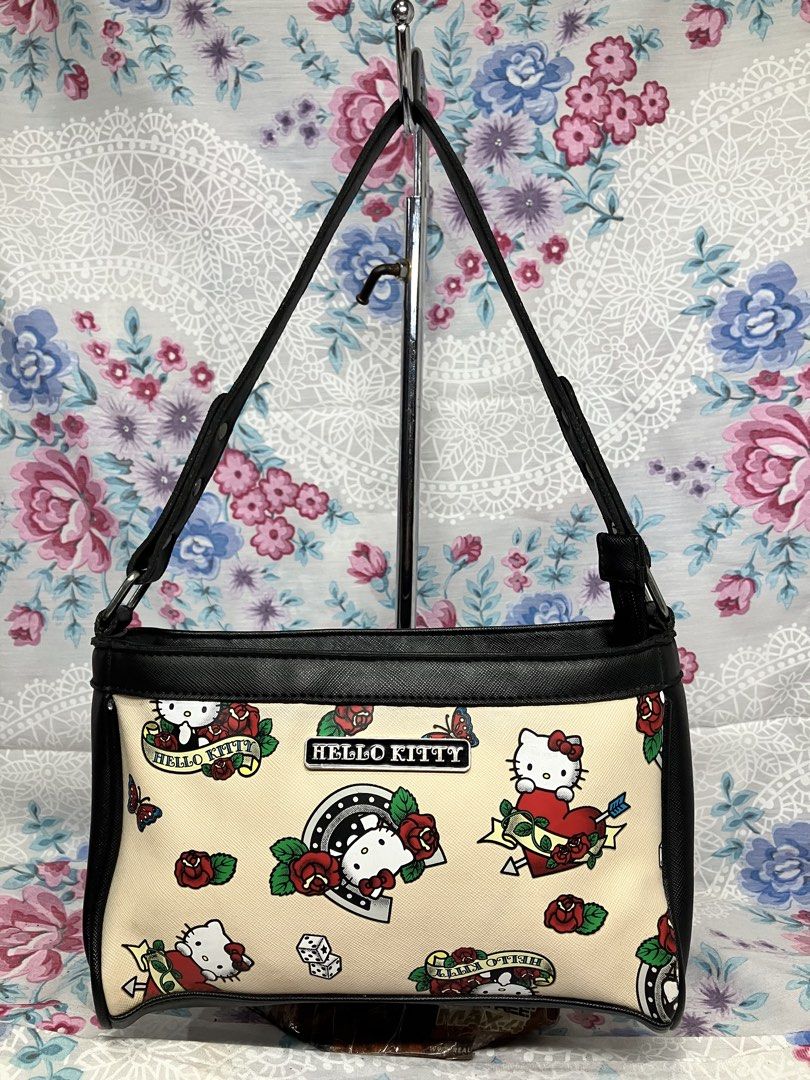SANRIO LICENSED HELLO KITTY ROSE MINI HANDBAG (Category: Shoulder Bags) located in General Mariano Alvarez. Submitted by adonid (Listing ID 1467445684, Image 1). Description: SANRIO LICENSED HELLO KITTY ROSE MINI HANDBAG GOOD CONDITION NORMAL SIGN OF USAGE ONLY .